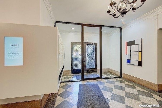 doorway to outside with an inviting chandelier and ornamental molding