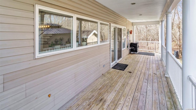 wooden terrace with covered porch