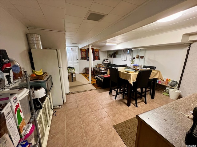 dining room featuring light tile patterned floors