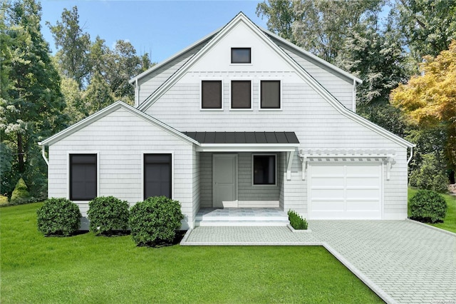 modern inspired farmhouse featuring a front lawn and a garage