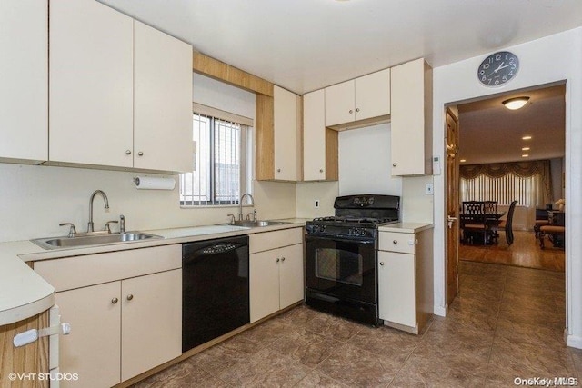 kitchen featuring dark hardwood / wood-style flooring, sink, white cabinetry, and black appliances