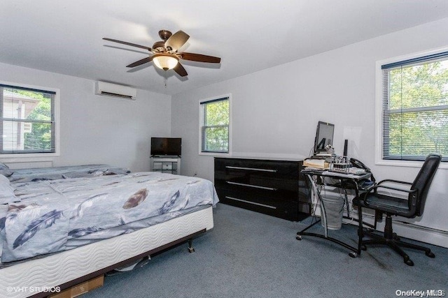 bedroom featuring multiple windows, ceiling fan, and a wall mounted air conditioner