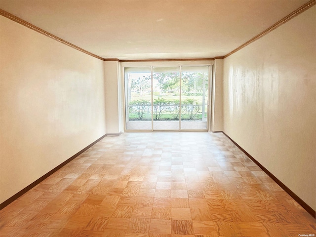 spare room with crown molding