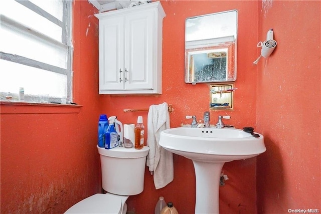 bathroom featuring toilet