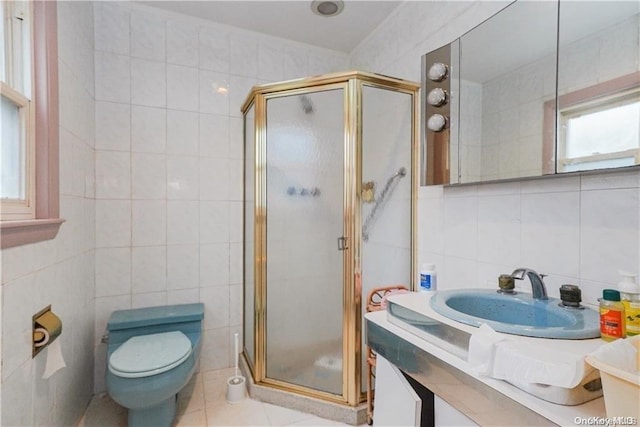 bathroom with an enclosed shower, tile walls, and toilet