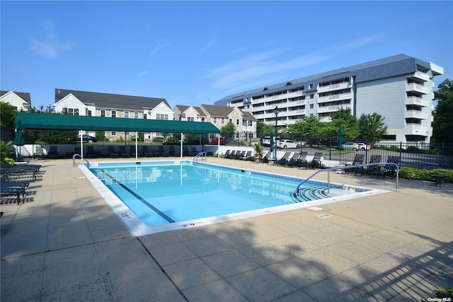 view of swimming pool featuring a patio