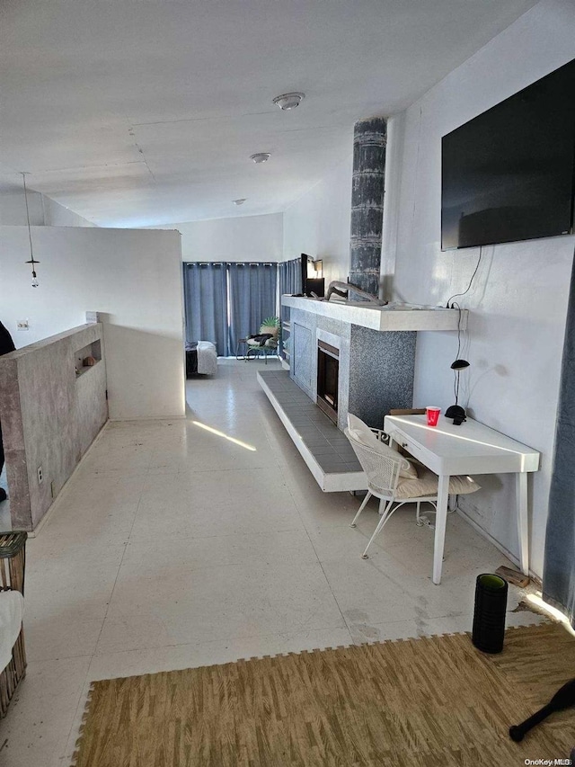 kitchen featuring a tile fireplace