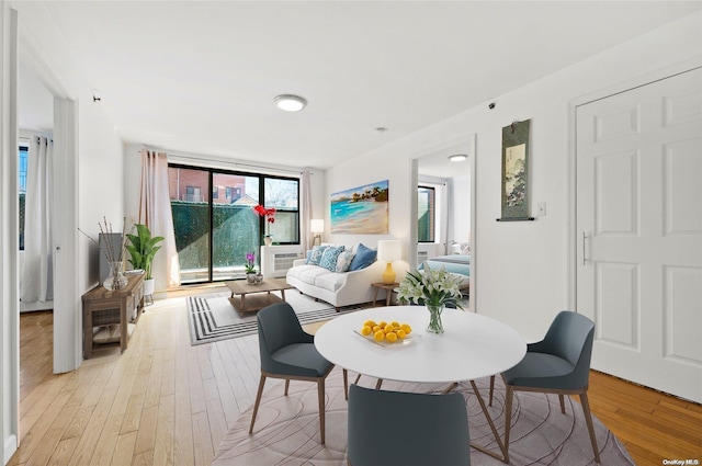 dining room with light wood-type flooring