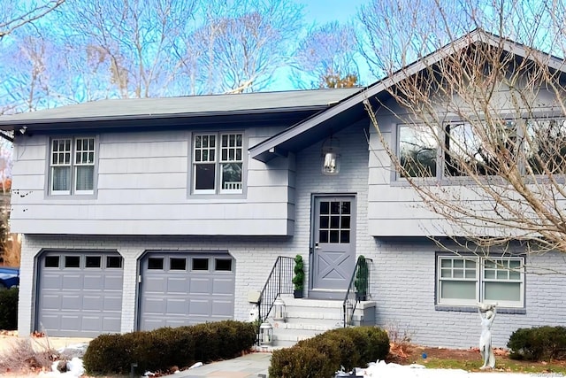 split foyer home featuring a garage