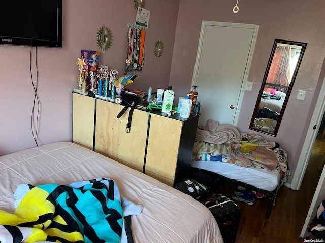 bedroom featuring hardwood / wood-style flooring