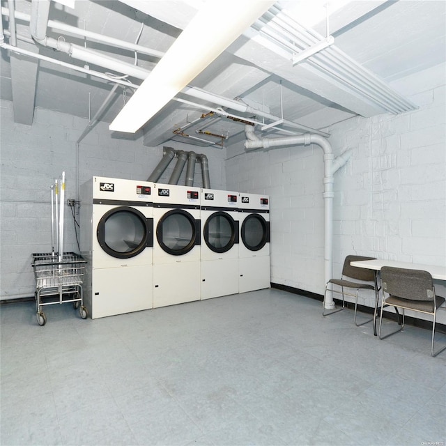 laundry room featuring separate washer and dryer