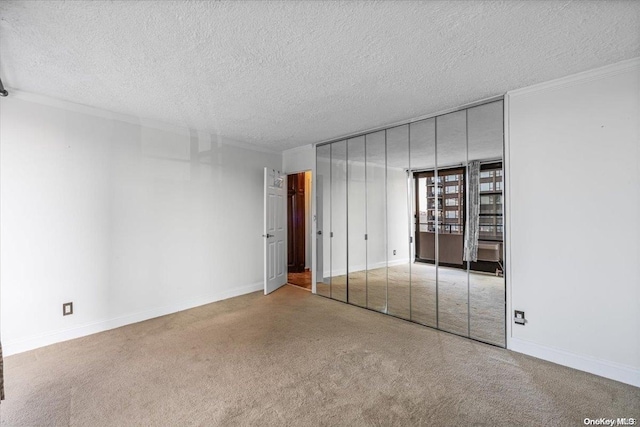 unfurnished bedroom with a closet and a textured ceiling