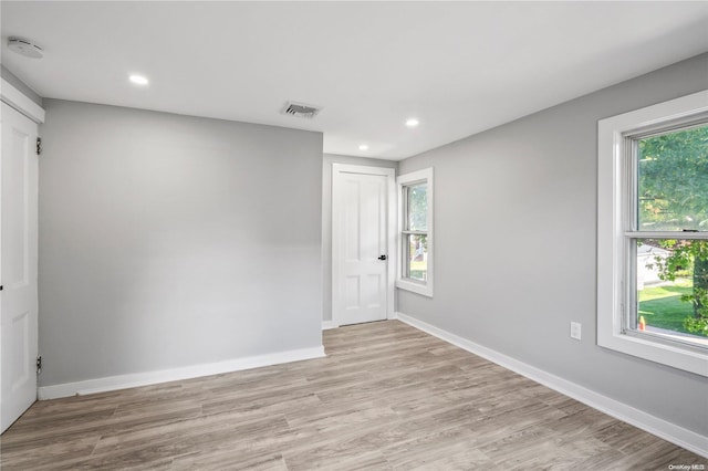 empty room featuring light hardwood / wood-style floors