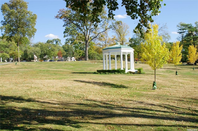 view of community featuring a gazebo and a yard