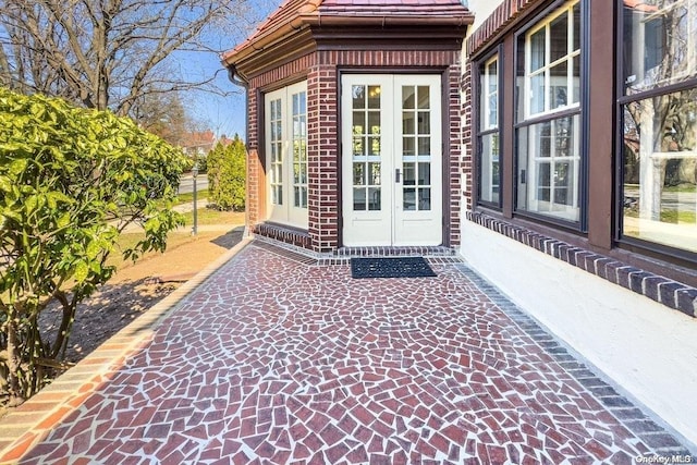 doorway to property featuring french doors