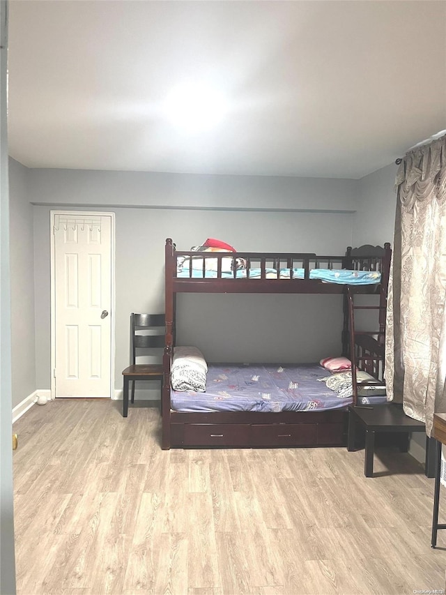 bedroom featuring light wood-type flooring