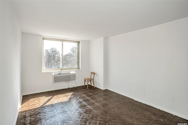 empty room featuring a wall mounted air conditioner