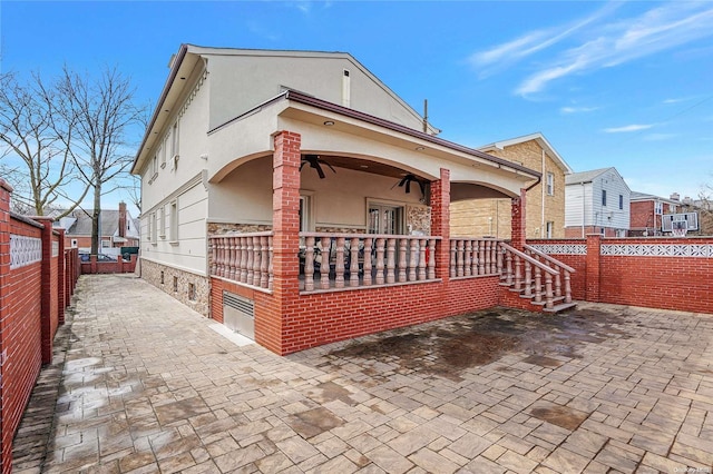 rear view of house with a porch