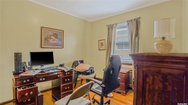 home office with crown molding and light wood-type flooring