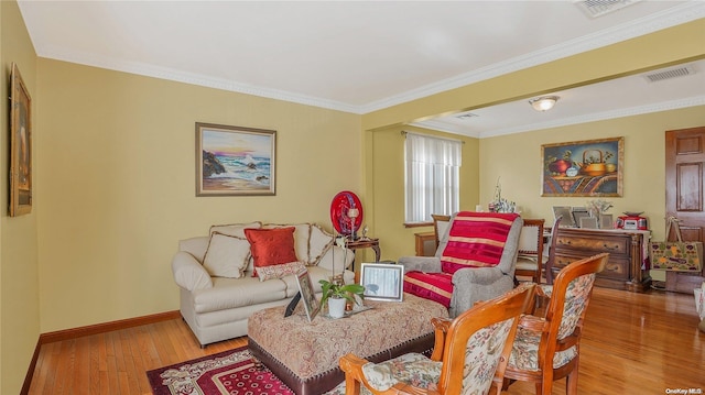 living room with crown molding and wood-type flooring