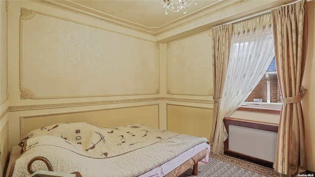 bedroom featuring crown molding