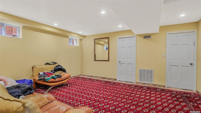 living area with carpet flooring