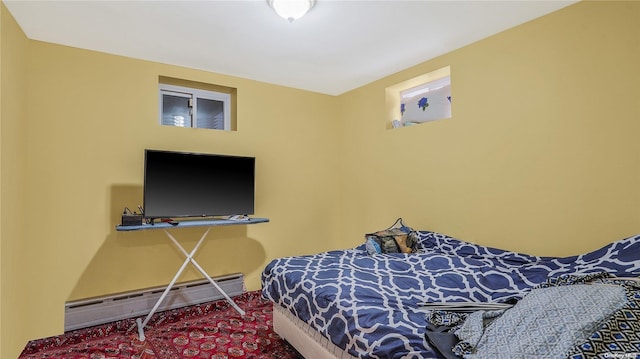 bedroom featuring a baseboard radiator