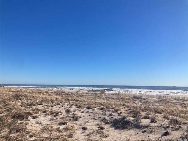 property view of water with a beach view