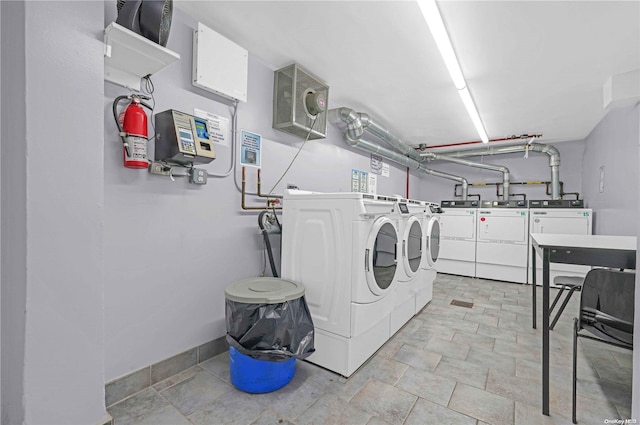 washroom featuring washer and dryer