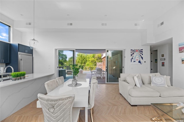 dining area with light parquet flooring