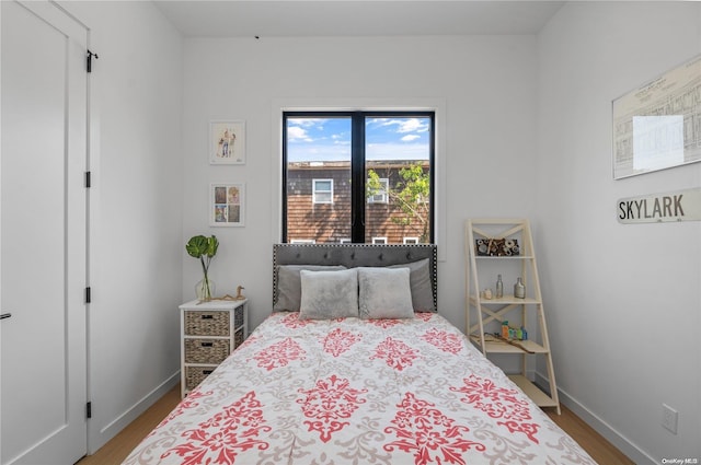 bedroom featuring hardwood / wood-style flooring