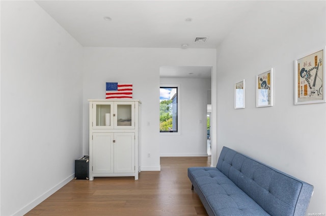 living area with wood-type flooring