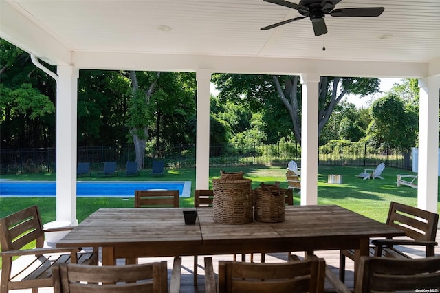 sunroom / solarium with ceiling fan