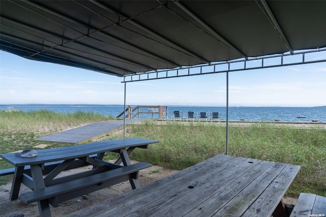 deck featuring a water view