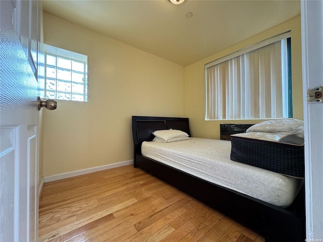 bedroom featuring light wood-type flooring