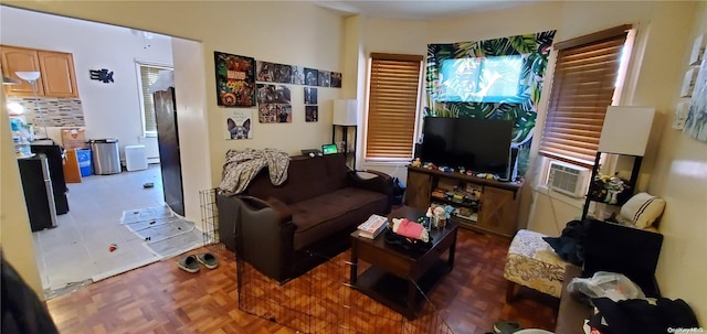 living room featuring dark parquet flooring and cooling unit