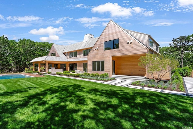 view of front of property with a front lawn