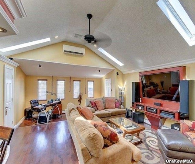 living room with an AC wall unit, vaulted ceiling, ceiling fan, a textured ceiling, and wood-type flooring