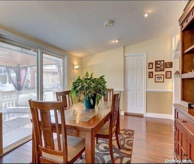 dining room featuring light hardwood / wood-style flooring