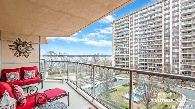 balcony with an outdoor hangout area