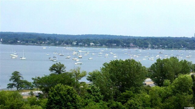 18-05 215th St Unit 5G, Bayside, NY 11360 - water view featuring a heavily wooded area
