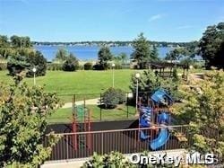 view of play area with a water view