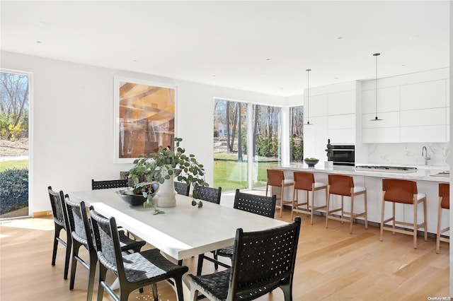 1739 Millstone Rd, Sag Harbor, NY 11963 - dining area featuring plenty of natural light and light wood-style flooring
