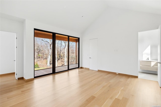 1739 Millstone Rd, Sag Harbor, NY 11963 - unfurnished room featuring light wood-type flooring, baseboards, and high vaulted ceiling