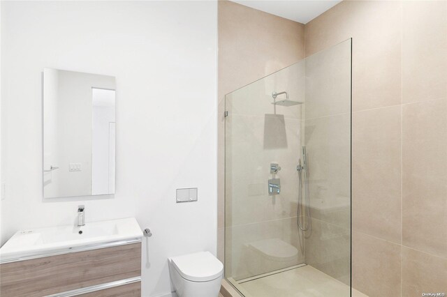 1739 Millstone Rd, Sag Harbor, NY 11963 - full bathroom featuring toilet, vanity, and a walk in shower