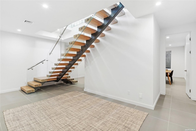 1739 Millstone Rd, Sag Harbor, NY 11963 - basement with recessed lighting, stairway, tile patterned floors, and visible vents