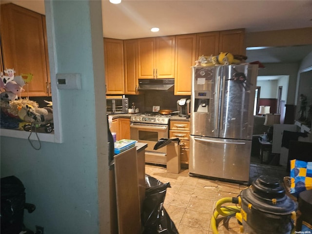 kitchen featuring light tile patterned floors and appliances with stainless steel finishes