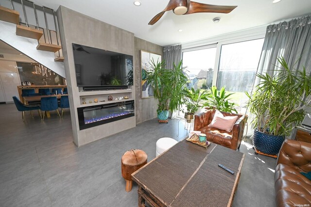 living room featuring ceiling fan