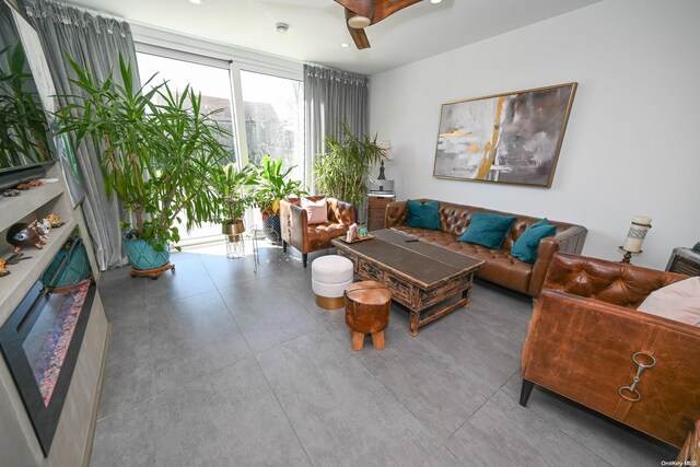 living room featuring ceiling fan