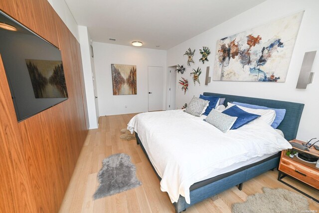 bedroom featuring light hardwood / wood-style flooring